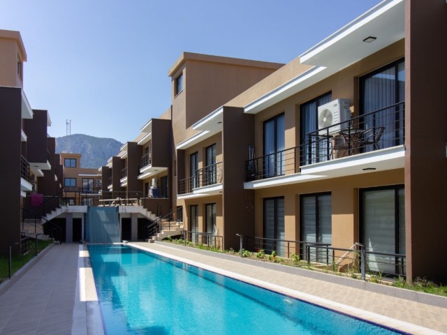 Girne Doğanköyde havuzlu sitede satılık 2+1 daire - Fotoğraf 2