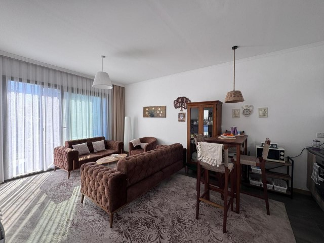 Girne Ozanköy de bahçeli 2+1 satıık daire.