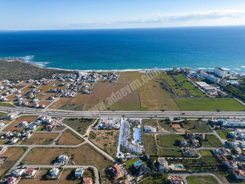 Apartments for Sale with Communal Pool within Walking Distance to the Sea in Yeniboğaziçi Region