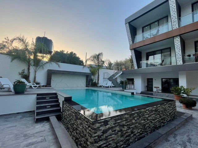 Girne Ozankoy 1+1 kiralik daire. Havuz katı