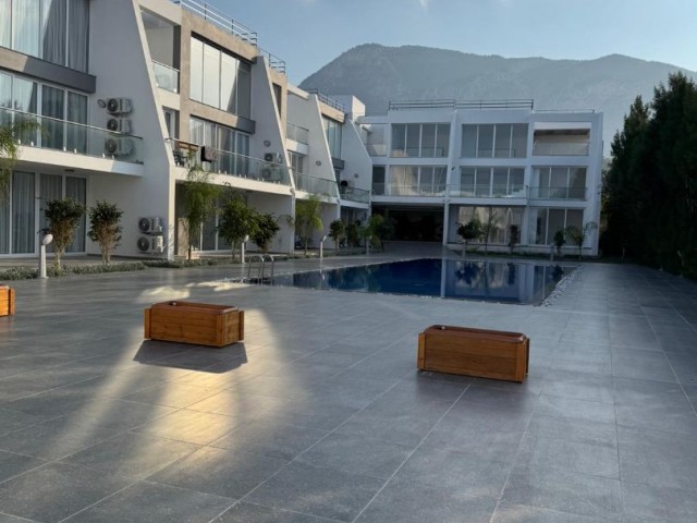 GIRNE DOGANKOYDE SATILIK 1+1 ORTAK HAVUZLU DAIRE 